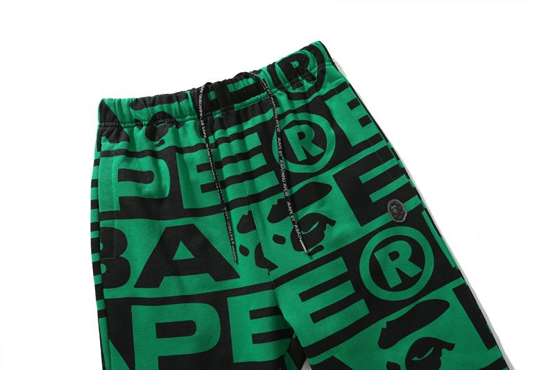 BAPE All-Over Letter Print Sweatpants
