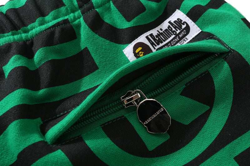 BAPE All-Over Letter Print Sweatpants