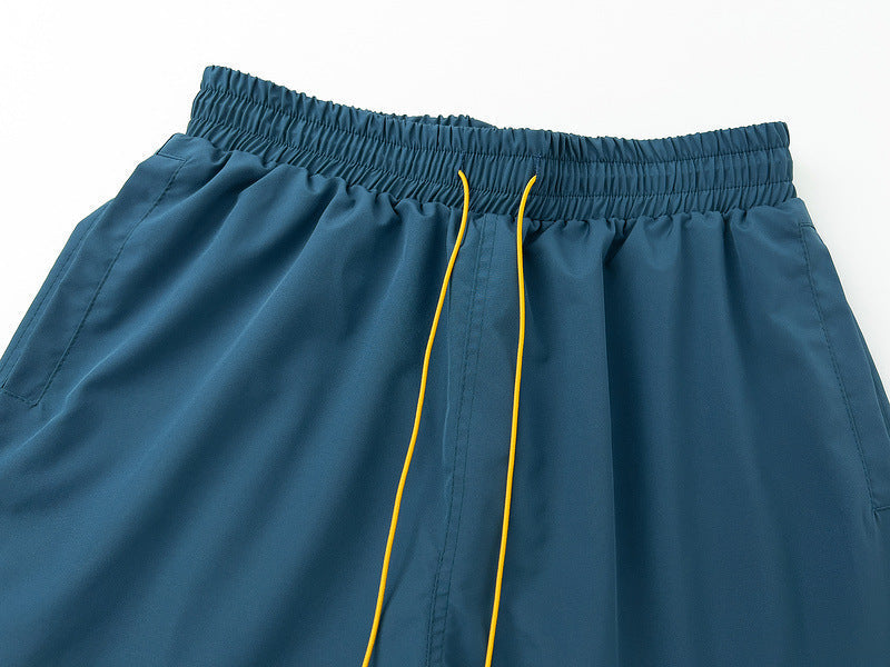 RHUDE Embroidered Tie Elastic Track Shorts – Blue